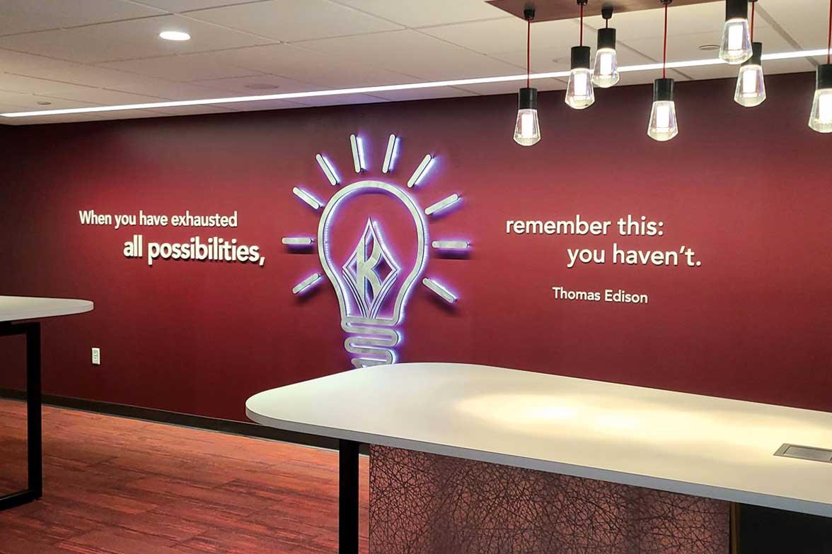 thomas edison quote, quote on wall, lit sign, interior illuminated sign, lit light bulb, wall display, inspirational wall display